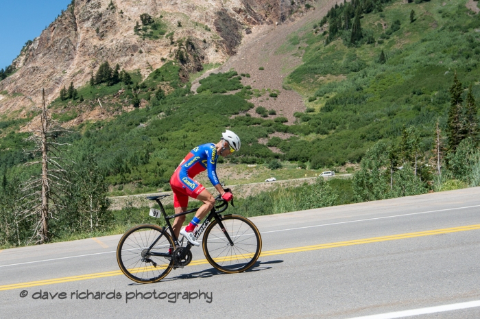 Oscar Sanchez Guarin (Canel's Specialized) is up out of the saddle in the climb up the Bypass Road during the Prologue at Snowbird, 2019 LHM Tour of Utah (Photo by Dave Richards, daverphoto.com)