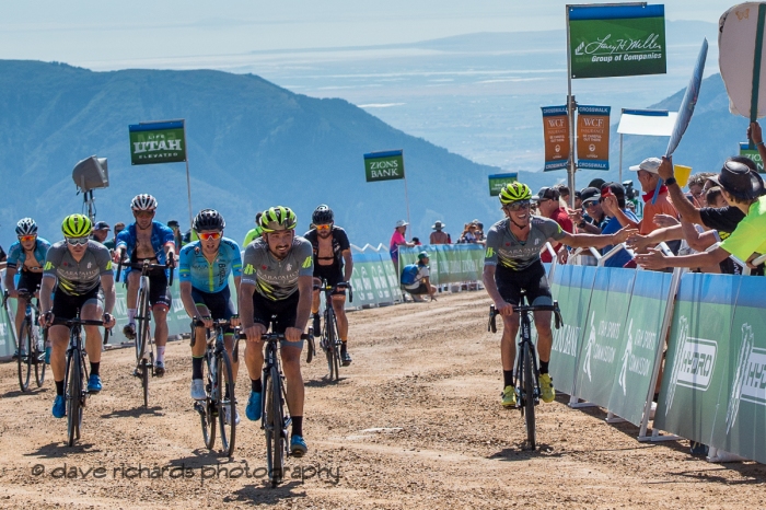 TJ Eisenhart (Arapahoe|Hincapie Powered by BMC) high fives some fans much to the delight of  the other riders on Stage 2 - Brigham City to Powder Mountain Resort, 2019 LHM Tour of Utah (Photo by Dave Richards, daverphoto.com)