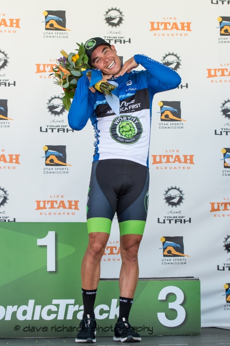 Travis McCabe (Worthy Pro Cycling) enjoys the adoration  for being chosen as the Fan Favorite Rider of the day. Stage 3 - Antelope Island State Park to North Salt Lake City, 2019 LHM Tour of Utah (Photo by Dave Richards, daverphoto.com)