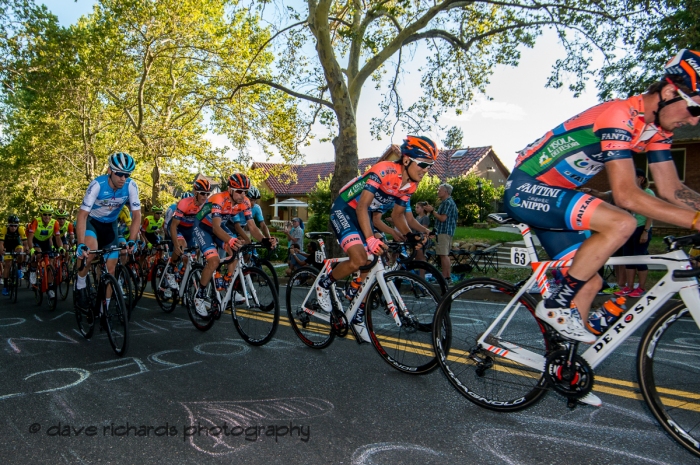 The strain of the State Street climb  shows on the riders faces. Stage 4 - Salt Lake City Circuit Race, 2019 LHM Tour of Utah (Photo by Dave Richards, daverphoto.com)