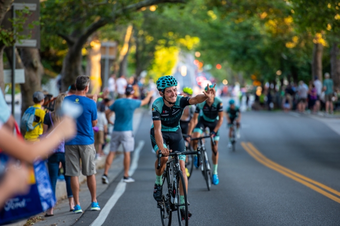 A 303 Project rider thanks the crowd for their support on his last lap up State Street. Stage 4, 2019 Tour of Utah. Photo by Steven L. Sheffield