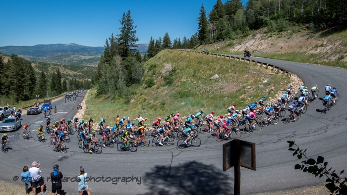 Riders hit a steep hairpin on the Wolf Creek Ranch climb. Stage 6, 2019 LHM Tour of Utah (Photo by Dave Richards, daverphoto.com)