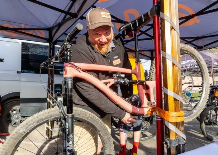 Esker Cycles owner, Tim Krueger, setting up an Esker Rowl 29er demo bike at the 2022 Hurricane MTB Festival.  The 2022 Hurricane MTB Festival venue on Saturday morning. Photo by John Shafer, Photo-John.net