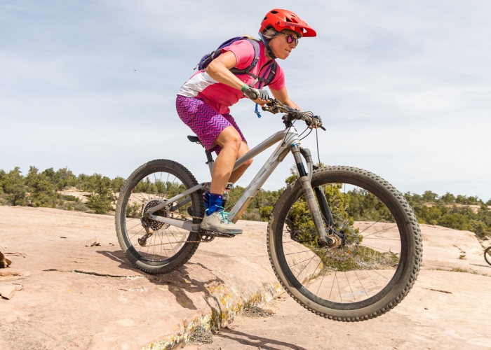 Angie Lockwood-Kurtz, working on her slickrock skills during a Hurricane MTB Festival group ride. Photo by John Shafer, Photo-John.net