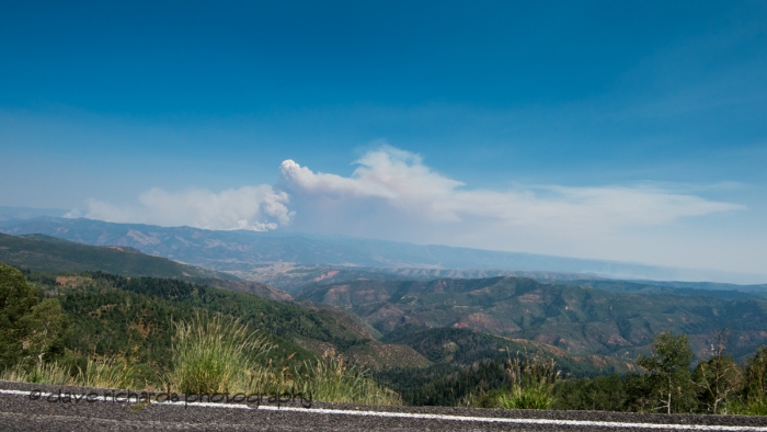 Forest fire plumes of smoke off in the distance were the order of the day making breathing difficult for the riders. Stage 2, 2018 LHM Tour of Utah cycling race (Photo by Dave Richards, daverphoto.com)