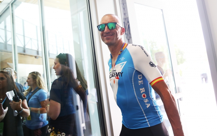 Israel Cycling Academy walks in good spirits before Team Presentation.  2018 Tour of Utah Team Presentation, August 4, 2018, Cedar City, Utah. Photo by Cathy Fegan-Kim, cottonsoxphotography.net