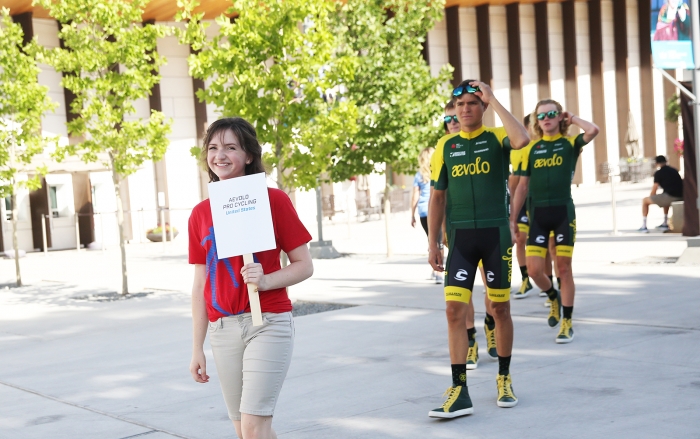 Young volunteers were excited to escort the teams onto the Team Presentation stage.  2018 Tour of Utah Team Presentation, August 4, 2018, Cedar City, Utah. Photo by Cathy Fegan-Kim, cottonsoxphotography.net