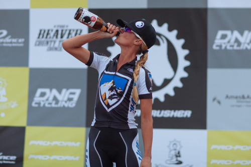 KUHL’s Joey Lythgoe savors the spoils of victory as the 2014 Crusher Pro Women’s champion. Photo by Catherine Fegan Kim/Cotton Sox Photography.