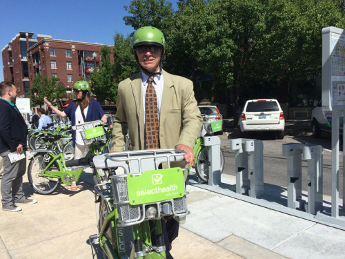 Salt Lake City Mayor Ralph Becker rode a GreenBike to and from the UCAIR Station dedication on June 2, 2015. Photo by Dave Iltis