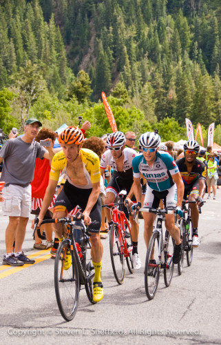 Michael Woods (in yellow) tries to hold on to his lead. He's shown here with Chris Horner, Frank Schleck, and Natnael Berhane. Photo by Steven Sheffield