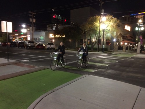 Gary Sjoquist and Ashley Korenblatt travel through Salt Lake City's new protected intersection at 200 S. and 300 W. The new bicycle master plan will produce further innovations such as this. Photo by Dave Iltis