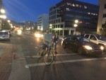 2 Riders on the new 300 S. Protected Bike Lane. Photo by Dave Iltis