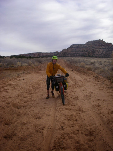 Most everything is great about southern Utah bike touring…..but sand can be a challenge! It’s not too bad on the Notom road, fortunately. Photo by Tom Diegel