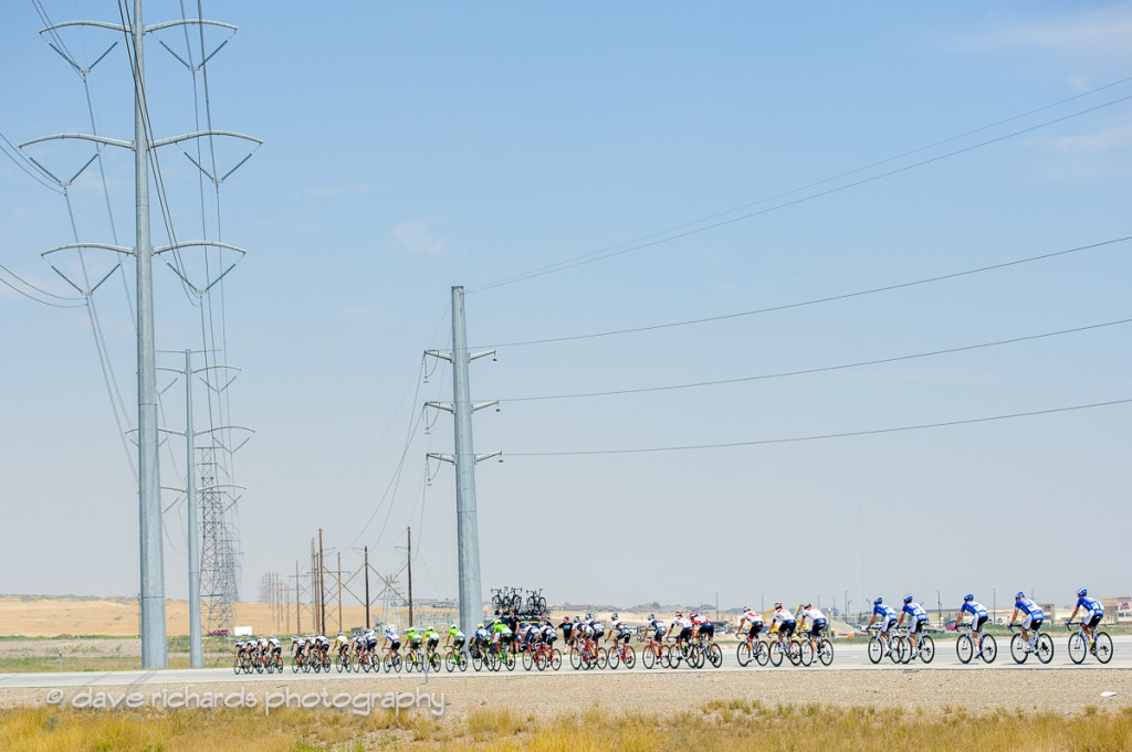 Riders are dwarfed by high voltage power lines during Stage 4, 2016 Tour of Utah. Photo by Dave Richards, daverphoto.com