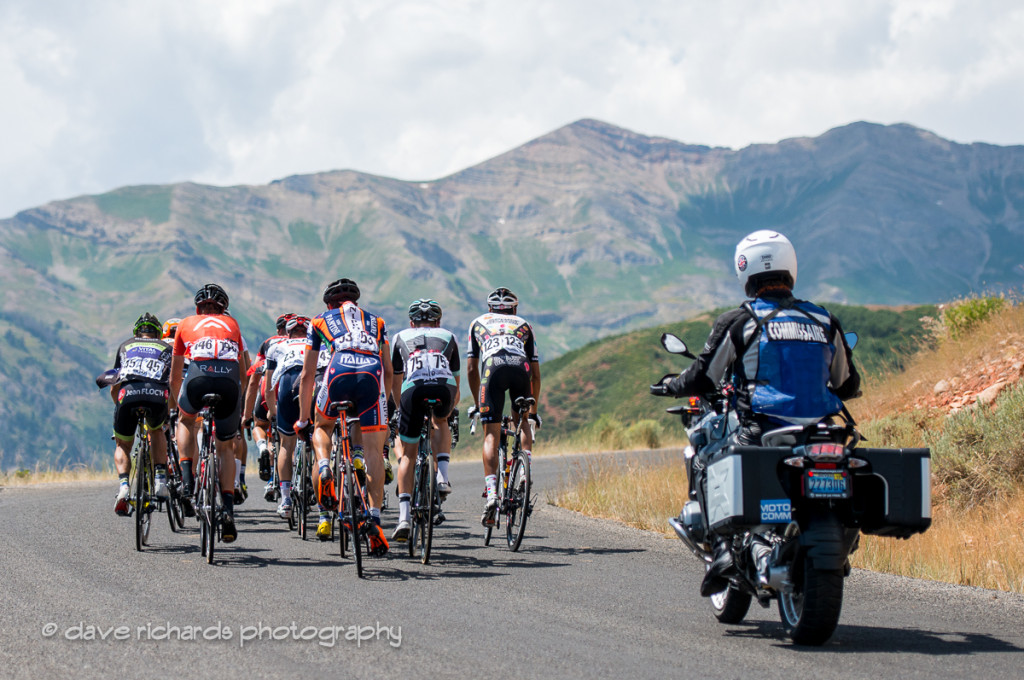 A small group of riders under the watchful eye of the moto commissaire, Stage 3, 2016 Tour of Utah. Photo by Dave Richards, daverphoto.com