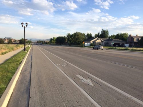 The ATIP is planning for more bike lanes throughout Salt Lake County. The lane shown here on Redwood Road in S. Jordan is of sub-standard width. The ATIP process allows for commenting on issues like this, and on the planned bike routes. Photo by Dave Iltis