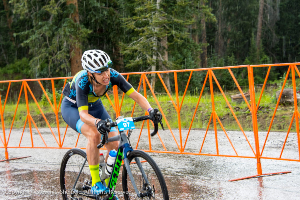 Mindy McCutcheon crosses the line to take a hard fought second place. Photo by Steven Sheffield