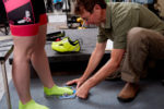 John Higgins measuring feet for cycling shoes. Photo by Derek Israelsen