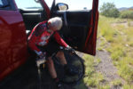 Dave fixing his last flat. Photo by Karma Ward