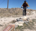 Derrick rides the skinny rocks at Eagle Mountain. Photo by Tom Jow