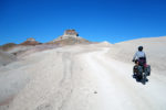 Danni Coffman rides through the Bentonite Hills. Photo by Jill Homer