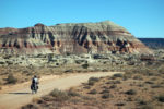 Danni rides through the Painted Desert. Photo by Jill Homer