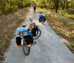 Cycling on the Flint Hills trail. Photo by John Roberson